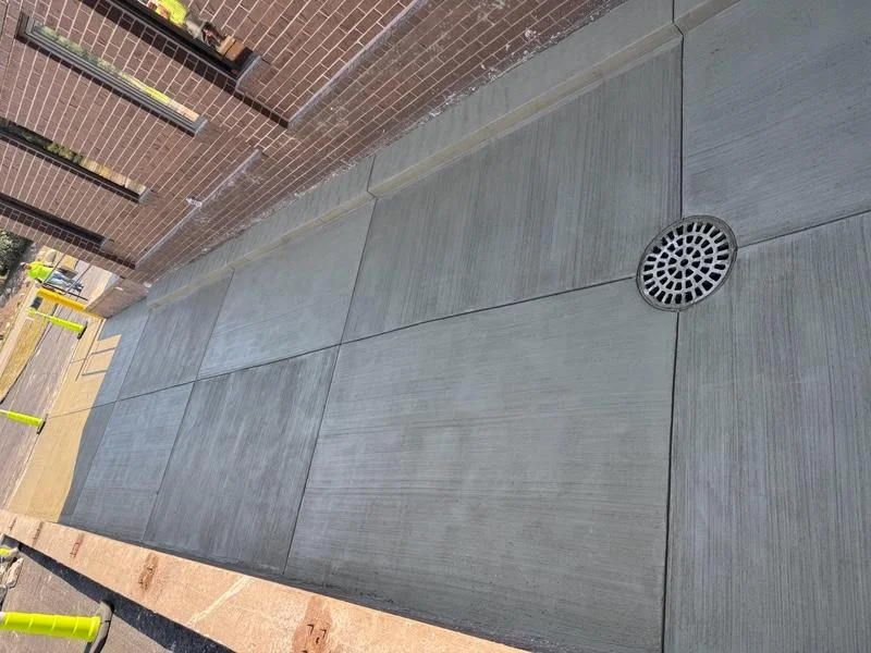 Finished concrete walk with drain detail