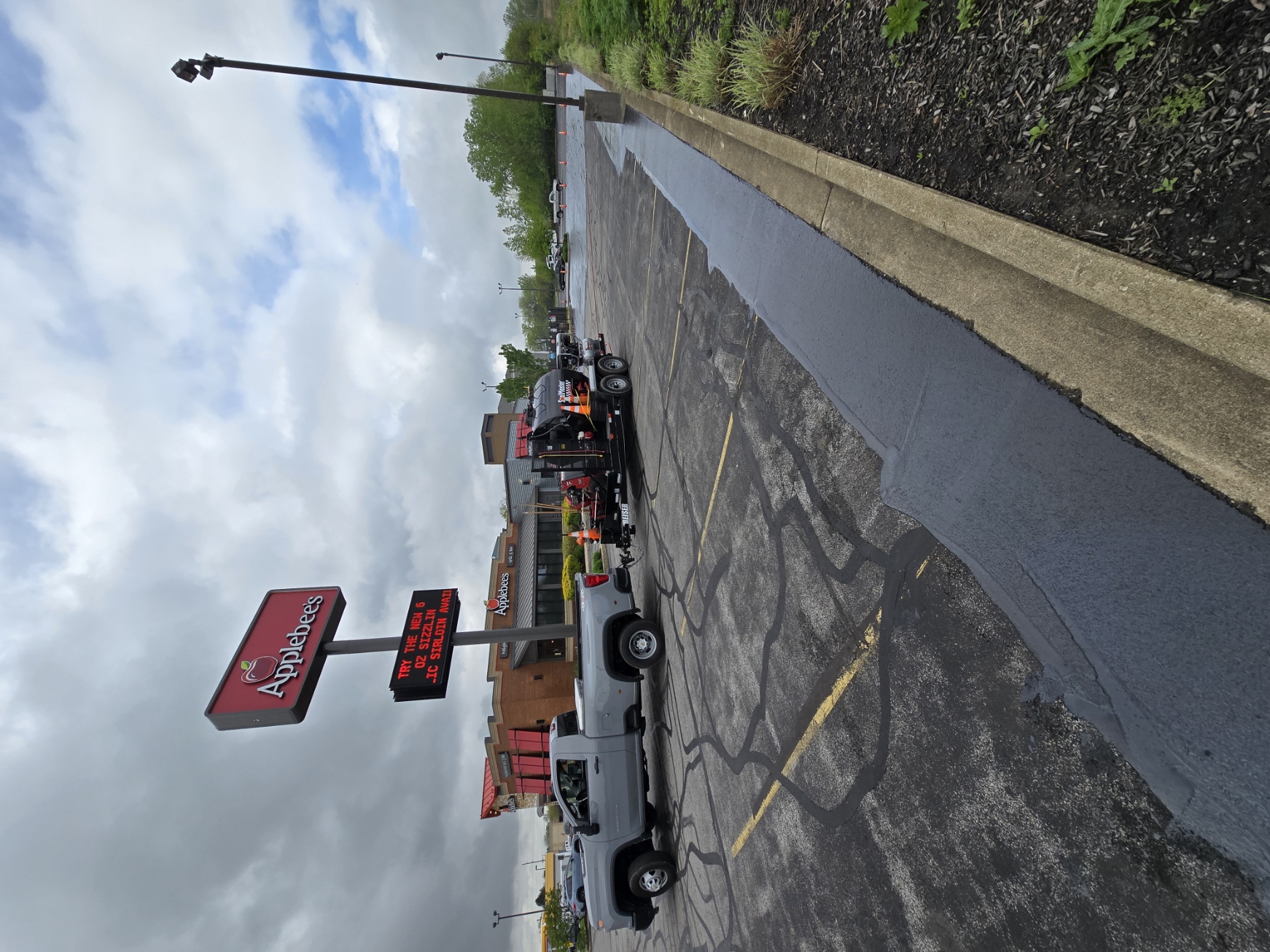 Commercial lot after sealcoating and surface treatment